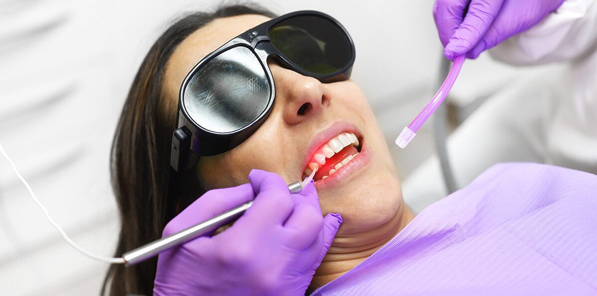 Dentist performing a dental procedure on a patient