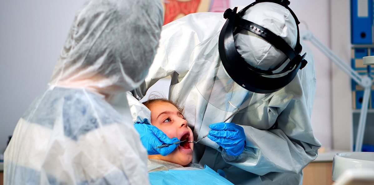 Dentist performing a dental procedure on a patient