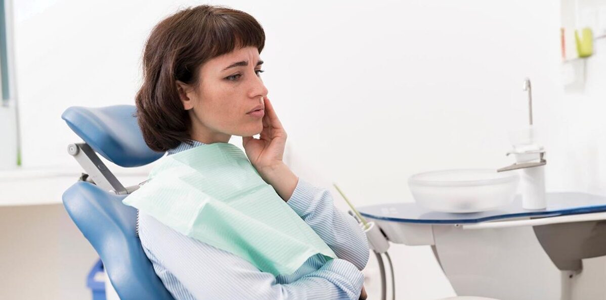 Patient facing toothache problem.