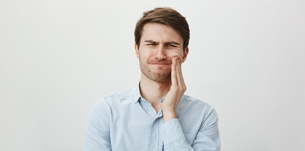 Boy with severe teeth pain.