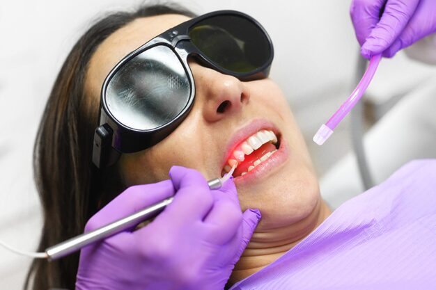 Dentist performing a dental procedure on a patient