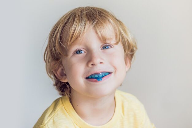 Little boy wearing mouthguard