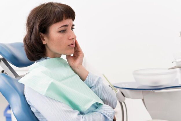 Patient facing toothache problem.